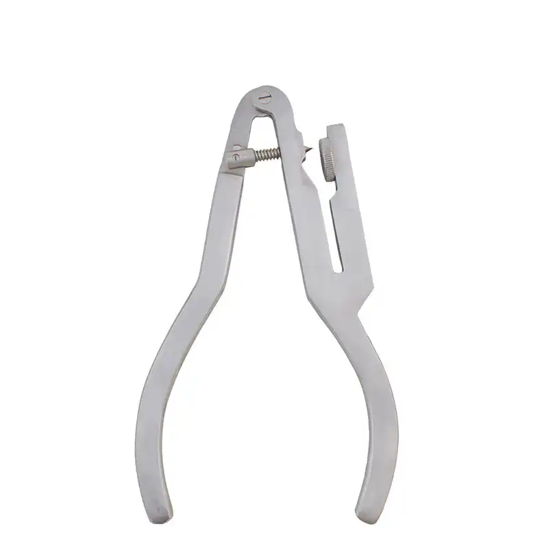 Ivory Bader Rubber Dam Punch